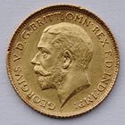 Moneda de oro con la izquierda de cara al retrato del perfil de George V