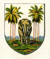 Protetor forma com um centro de elefante e quatro palmeiras de cada lado